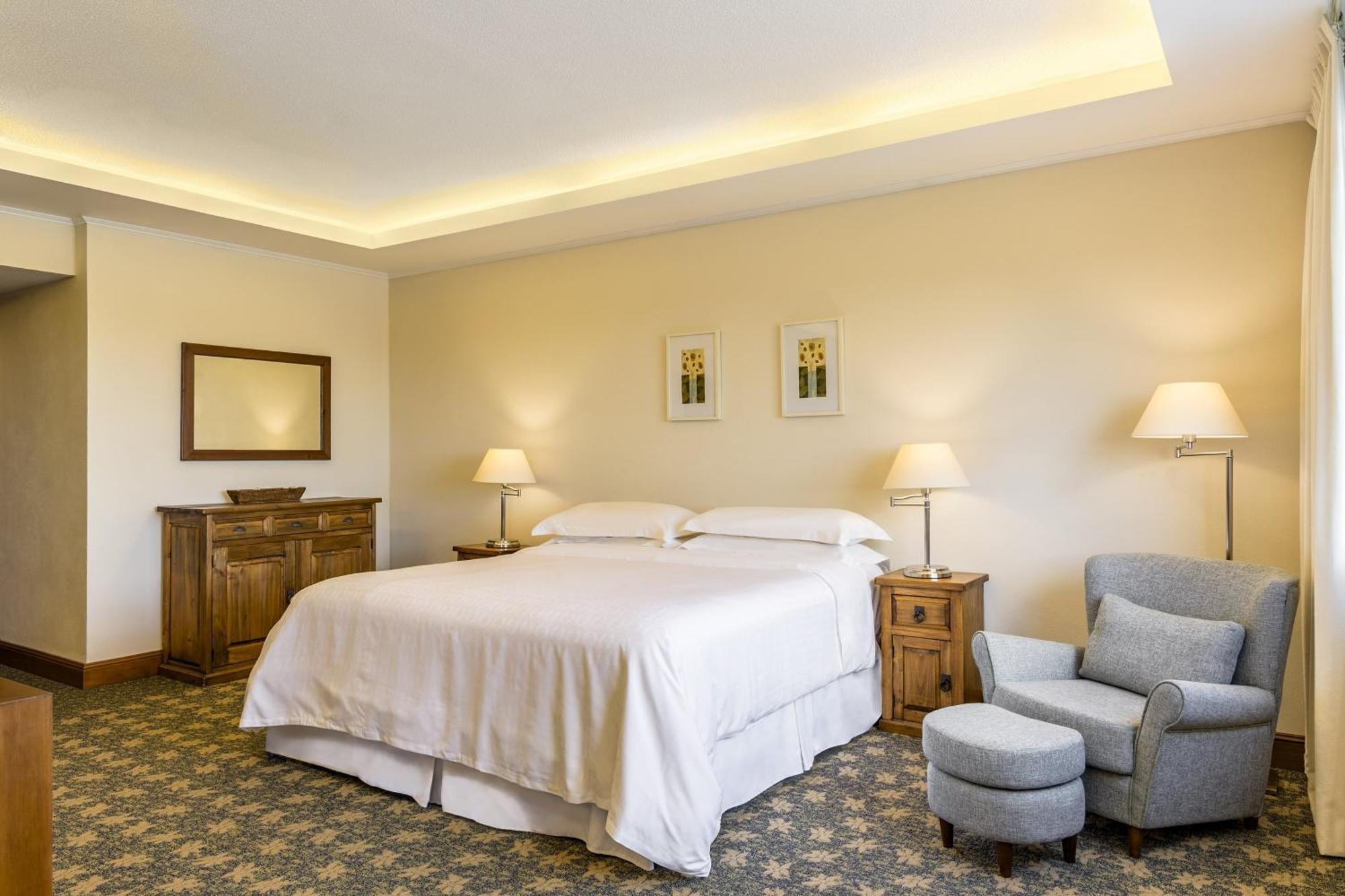 쉐라톤 콜로니아 골프 앤 스파 리조트 콜로니아델사크라멘토 외부 사진 A bedroom at the hotel